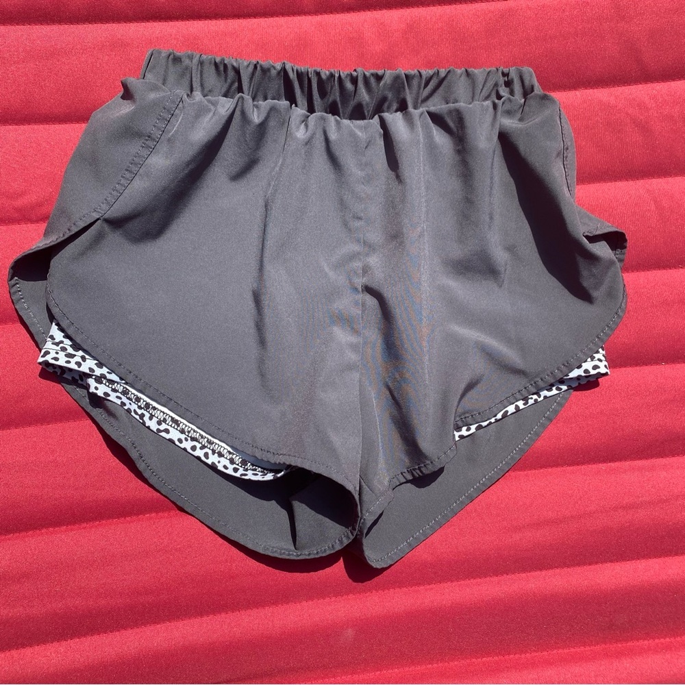 Shein grey athletic shorts with animal printed shorts underneath size:4